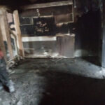Worker in Burned Building